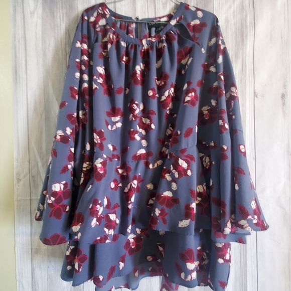 Lane Bryant Tops - Lane Bryant  sz 26. Floral print ruffled bottom high low. Bell sleeves cutouts